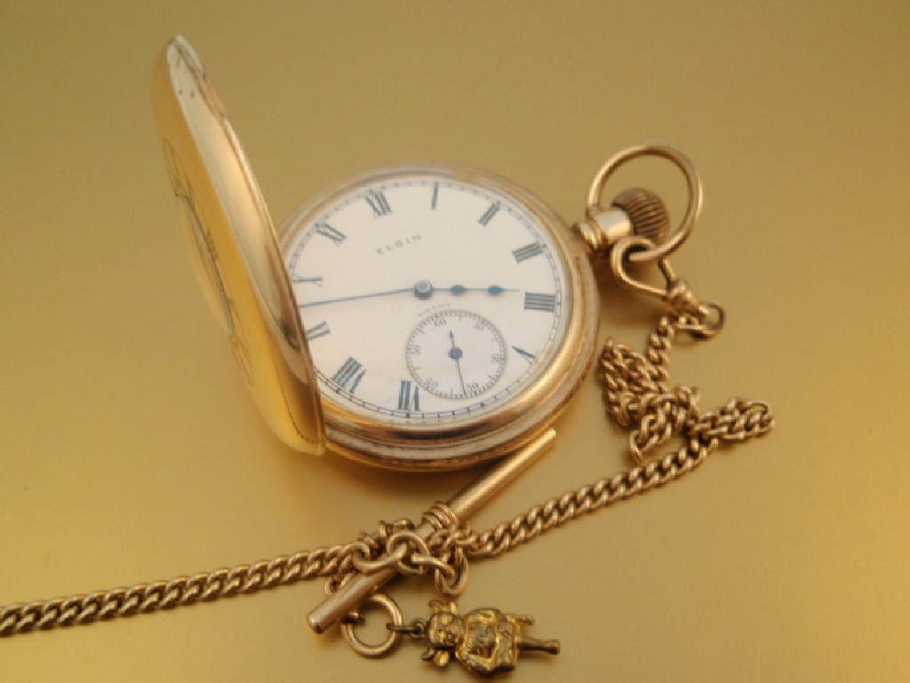 Appraisal: An Elgin gold plated half hunter watch and chain