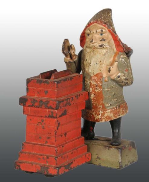 Appraisal: Cast Iron Santa Claus at Chimney Mechanical Bank Description American