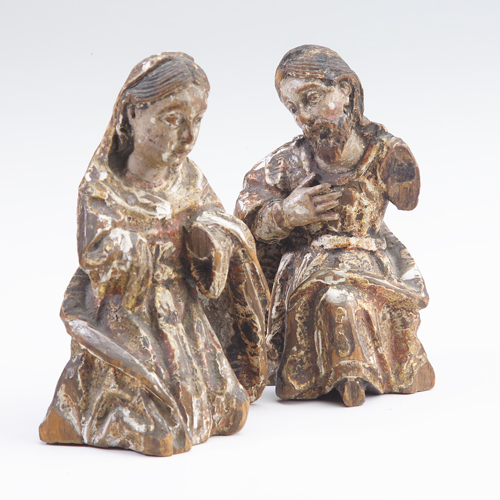 Appraisal: Primitive carved wood figures of Mary and Joseph with remains