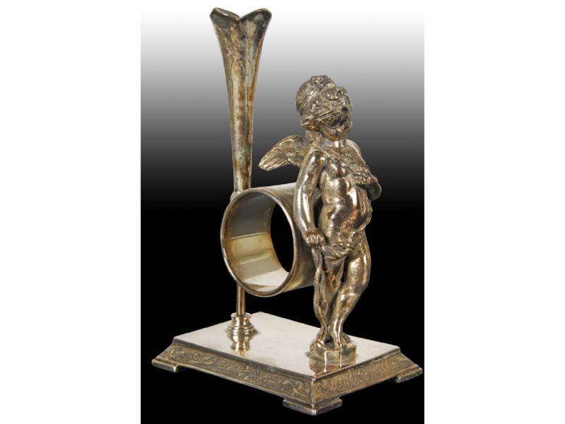 Appraisal: Large Standing Cupid Figural Napkin Ring with Bud Description Raised