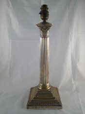 Appraisal: Militaria A large silver corinthian column table lamp an Indian