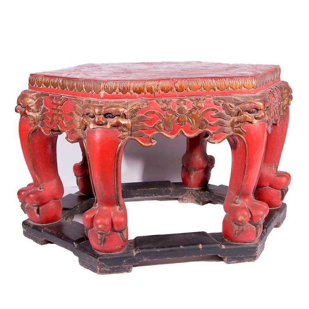 Appraisal: A th century red lacquered Chinese table A finely carved