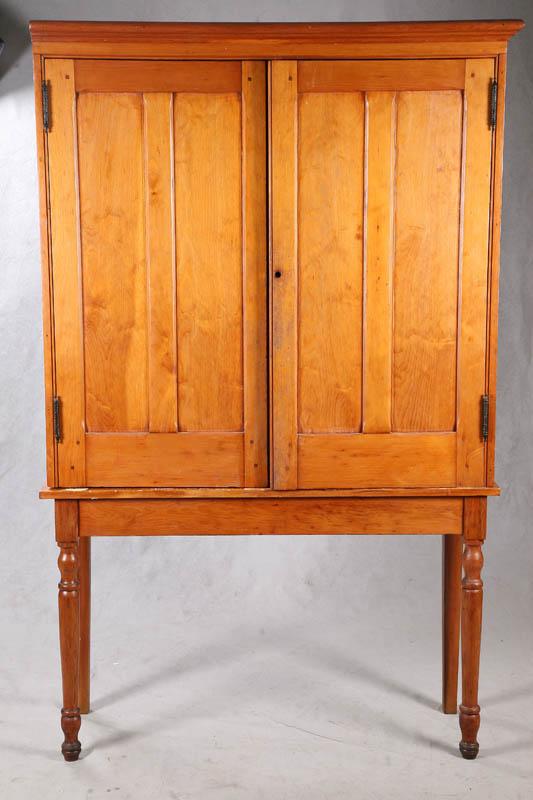 Appraisal: CUPBOARD TOP ON BASE Pine top with paneled doors and