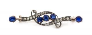 Appraisal: A Victorian Silver Topped Gold Sapphire and Diamond Brooch dwts