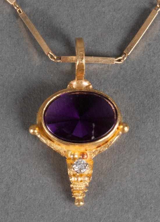 Appraisal: K yellow gold diamond and amethyst pendant with a K