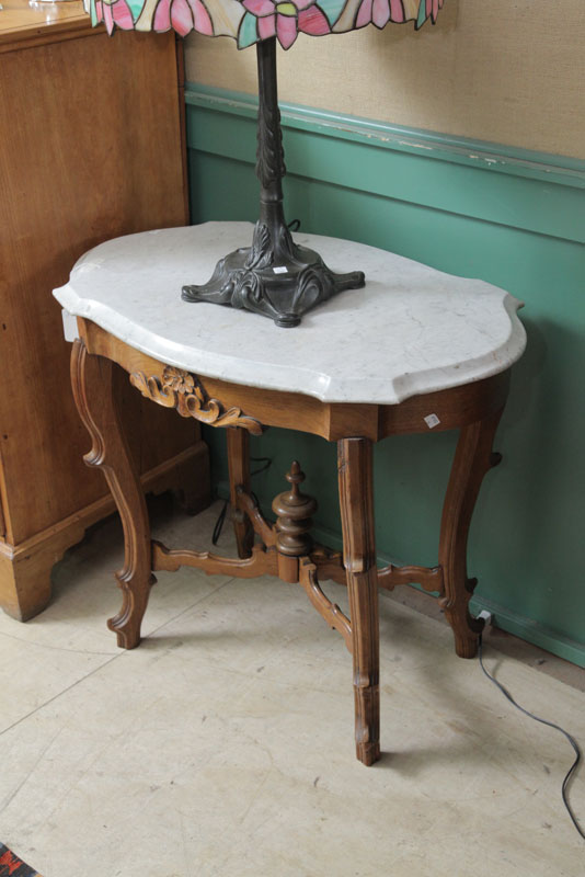 Appraisal: VICTORIAN MARBLE TOP TABLE White turtle shaped top floral carved