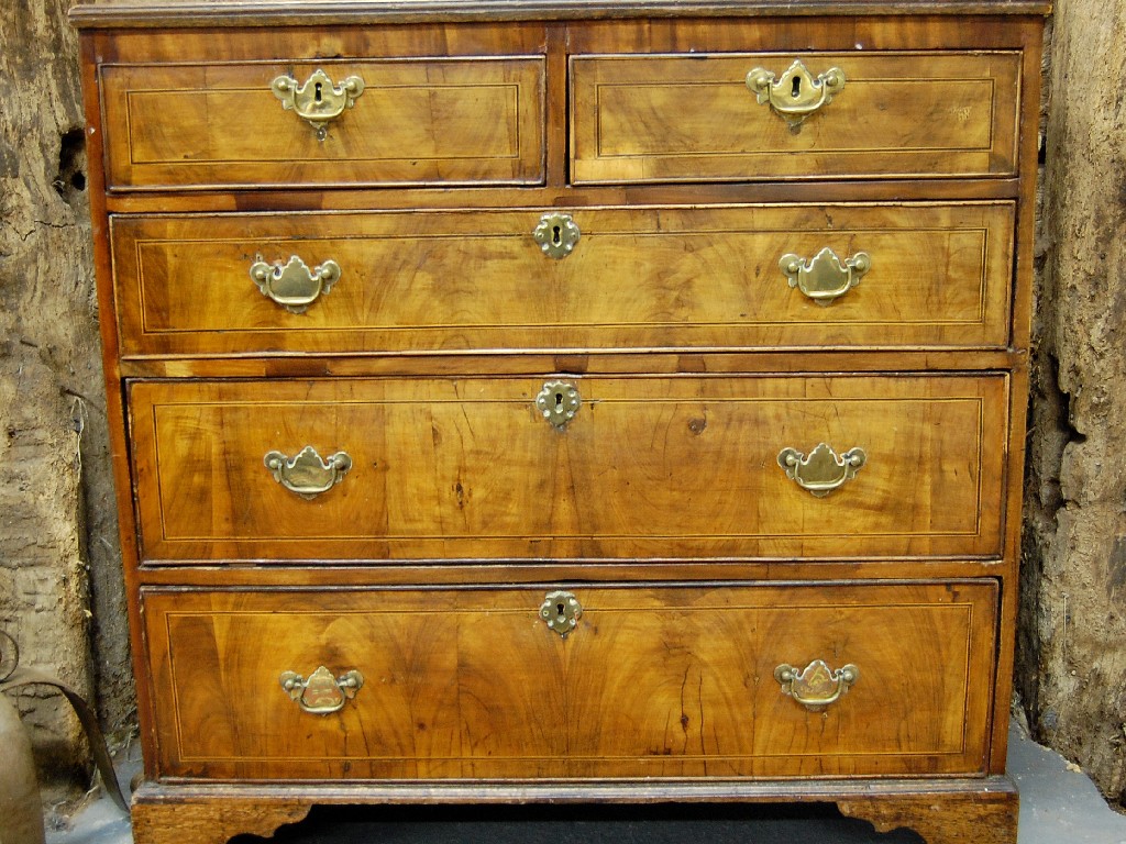 Appraisal: An early th century mahogany chest of two short over