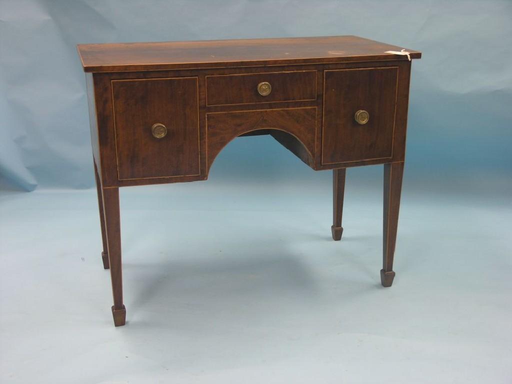 Appraisal: A th century mahogany kneehole writing table one shallow and