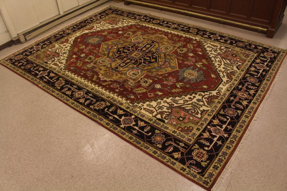 Appraisal: HAND KNOTTED ORIENTAL CARPET Persian Serapi or Heriz design '