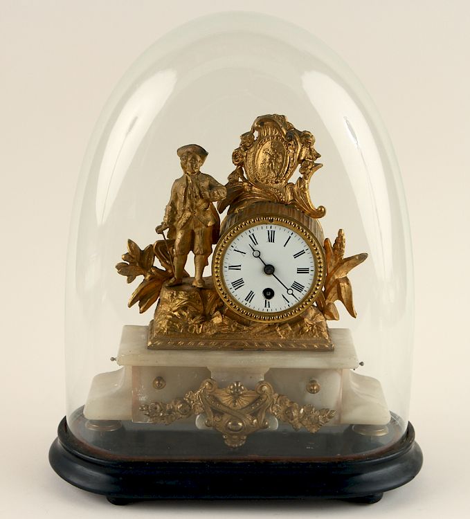 Appraisal: TH CENT GLASS DOMED GILT METAL MANTLE CLOCK A nineteenth