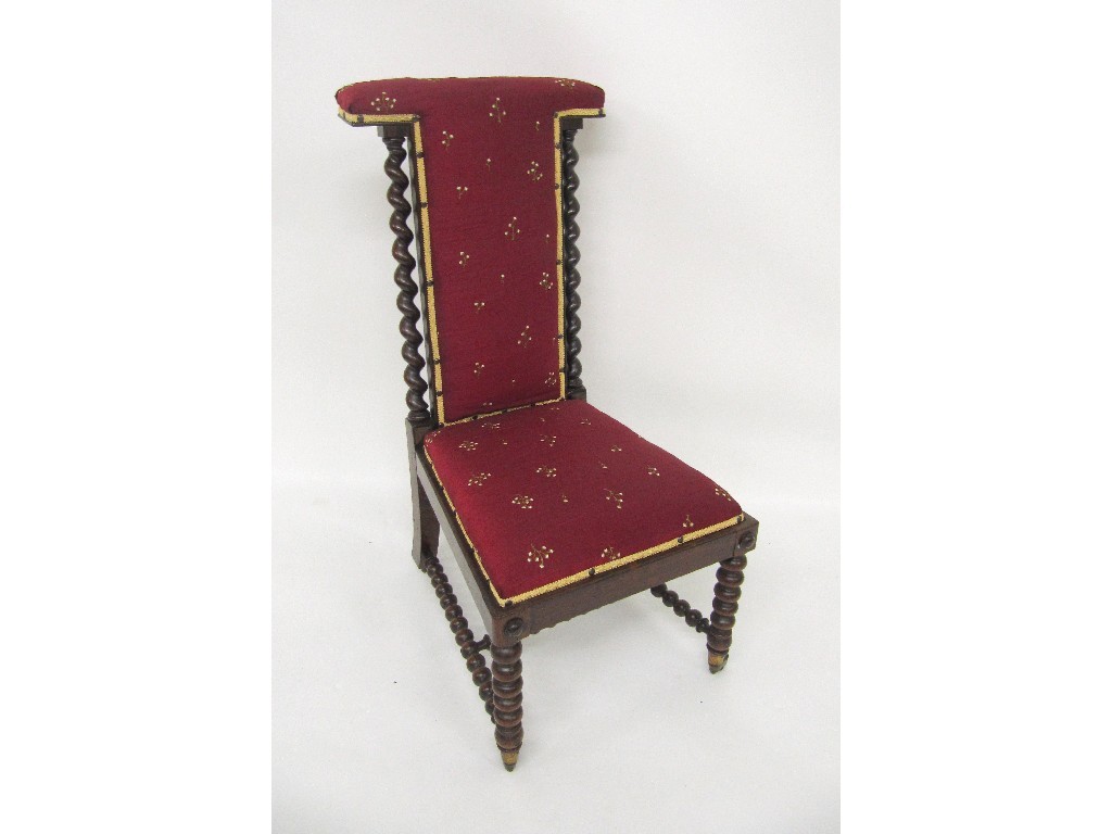 Appraisal: A Victorian rosewood prie dieu chair raised on barley and