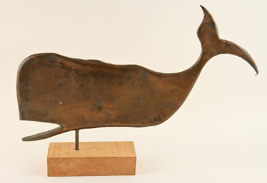 Appraisal: COPPER WHALE SHAPED WEATHERVANE ON WOOD STAND A copper whale