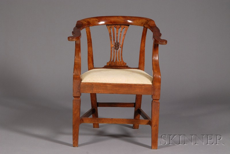 Appraisal: Italian Carved Fruitwood Armchair c U-shaped armrest above an open