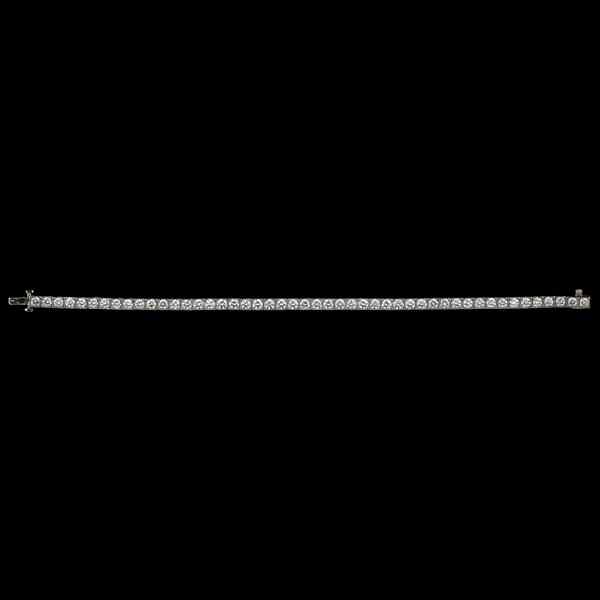 Appraisal: Platinum and Diamond Bracelet Platinum and diamond line bracelet containing