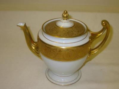 Appraisal: A CZECHOSLOVAKIAN TEA SERVICE for ten settings with harp handle