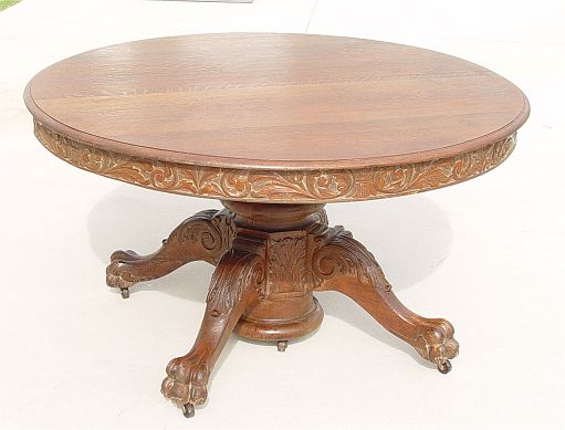 Appraisal: HORNER QUALITY ROUND CARVED OAK PAW FEET DINING TABLE Massive