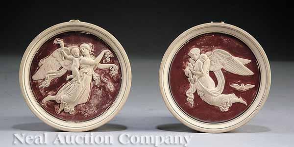 Appraisal: A Pair of Danish Earthenware Roundels Molded in Relief with