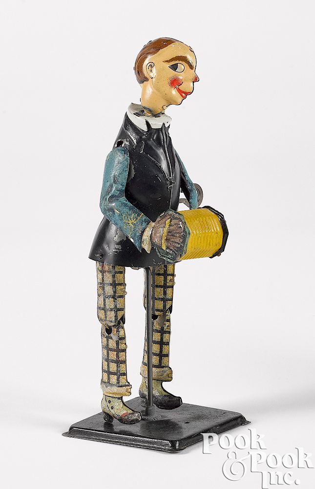 Appraisal: German tin lithograph wind-up dancer German tin lithograph wind-up dancer