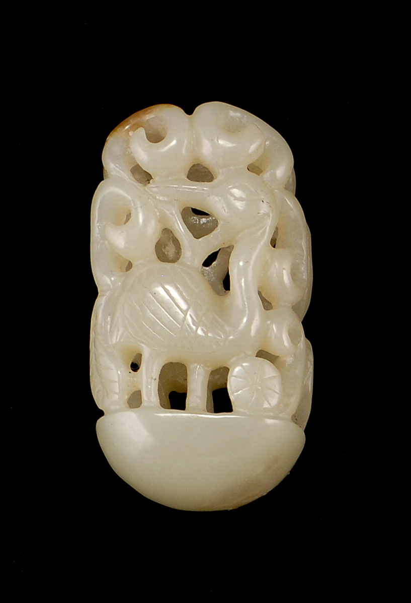 Appraisal: CELADON AND RUSSET JADE PENDANT With openwork crane and grasses