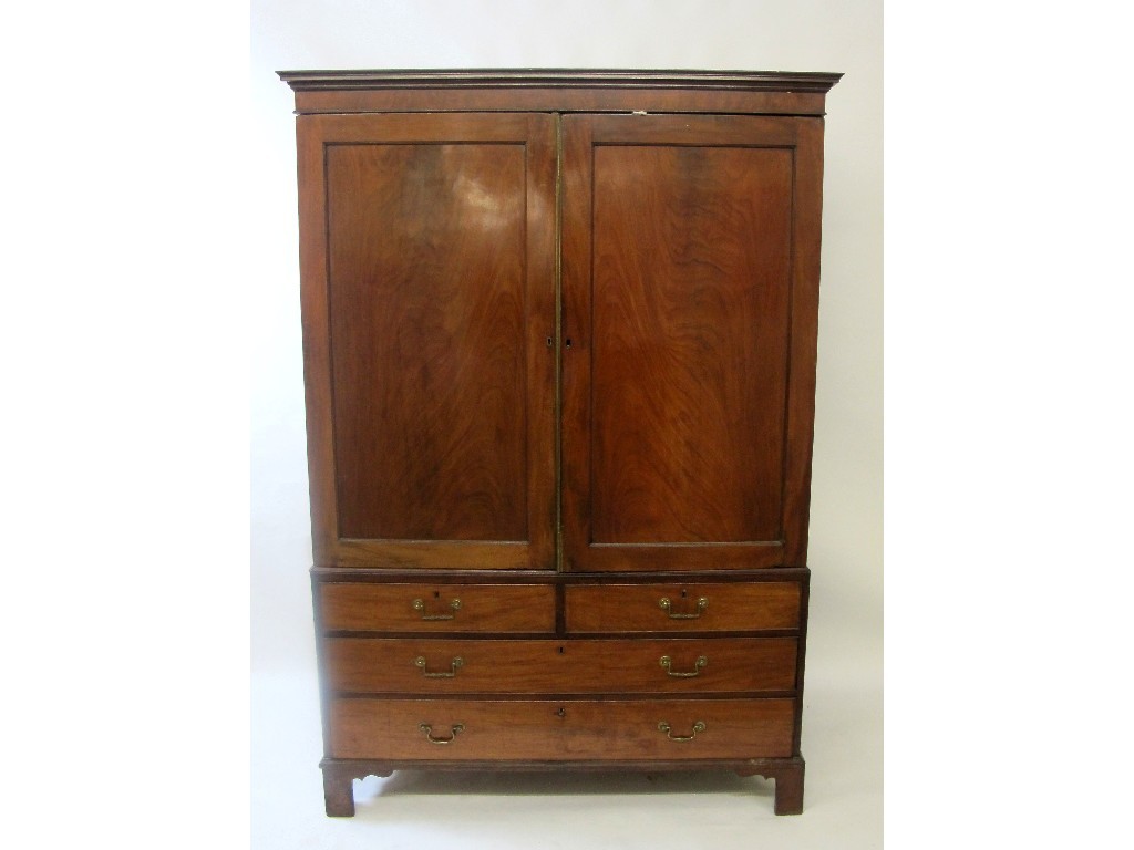 Appraisal: A th Century mahogany two door linen press above two