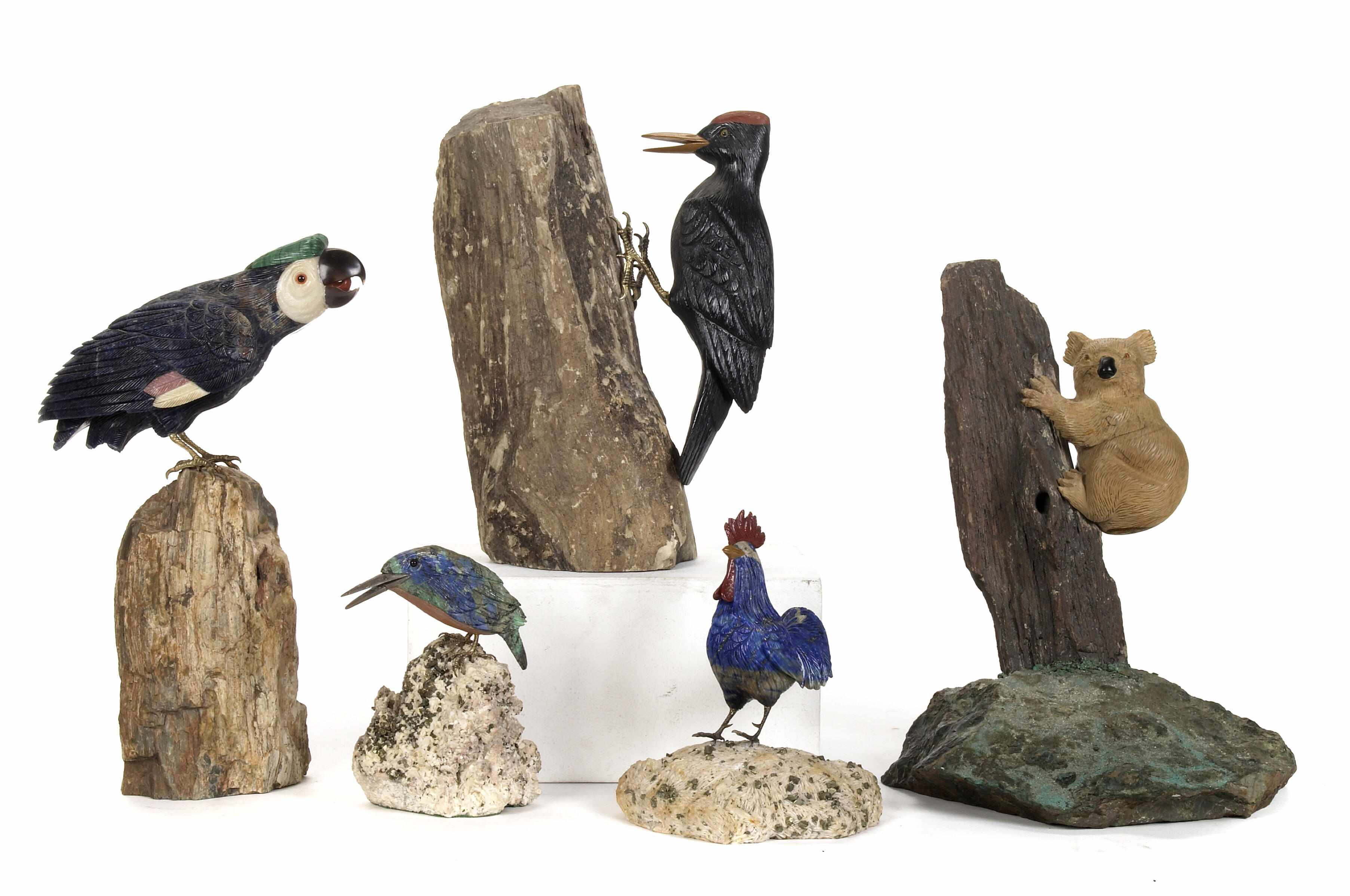 Appraisal: An assembled group of carved hardstone models of four birds