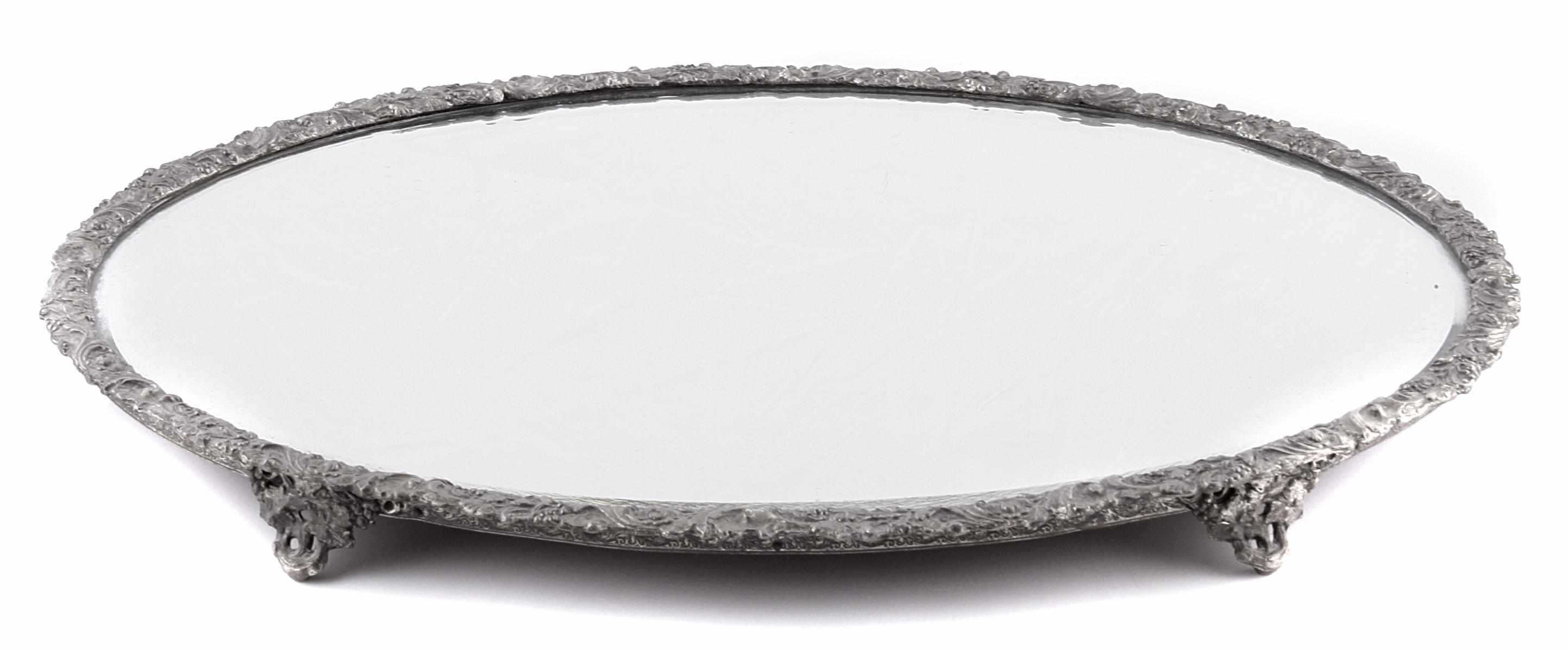 Appraisal: A Continental silvered metal mirrored plateau width in depth in