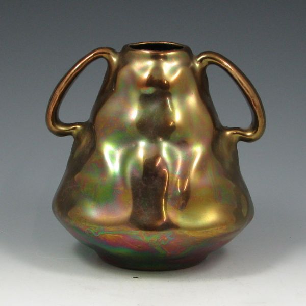 Appraisal: Owens Venetian handled vase with iridescent glaze Marked with original