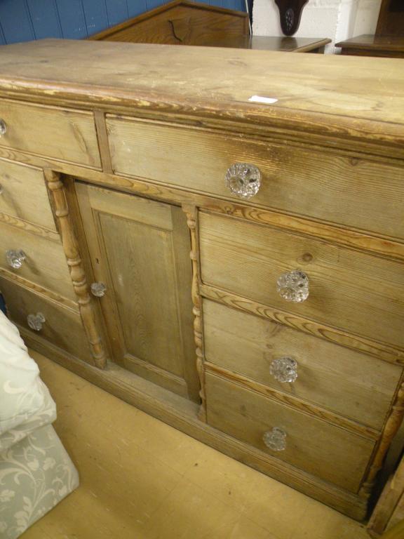 Appraisal: A pine sideboard or dresser base with an arrangement of