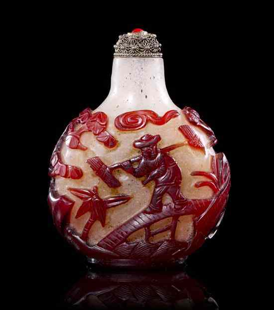 Appraisal: A Red Glass Overlay Snuff Bottle of compressed flask form