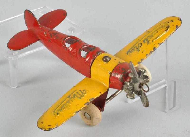 Appraisal: Cast Iron Kilgore Mystery Airplane Toy Description American Embossed Travel