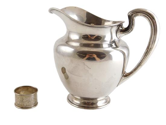 Appraisal: SILVER Sterling silver pitcher and child's napkin ring pitcher with