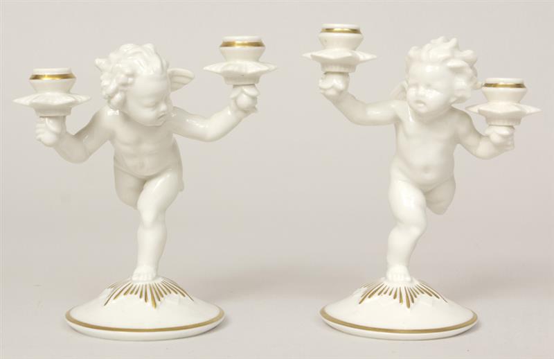 Appraisal: Pair of Hutschenreuther Porcelain Running Cherub Two-Light Candelabra Impressed 'K