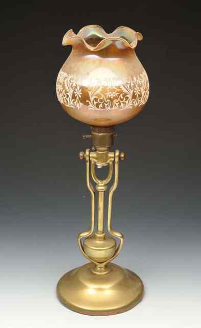 Appraisal: A VICTORIAN BRASS LAMP now converted to electricity with patent