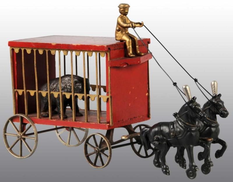 Appraisal: Cast Iron Wood Arcade -Horse Circus Wagon Toy Description Includes