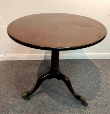 Appraisal: A George II mahogany tripod table circa the circular top