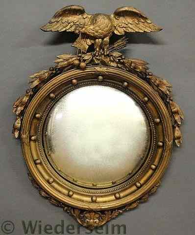 Appraisal: Gilt decorated girandole mirror with a spread-winged eagle crest h