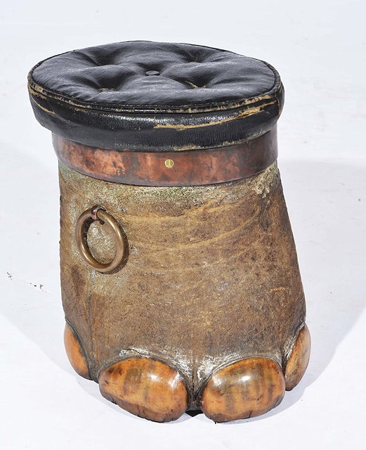 Appraisal: AN EARLY TH CENTURY ELEPHANT'S FOOT STOOL with ring brass