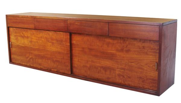 Appraisal: MODERN Walnut credenza with sliding doors and four drawers From