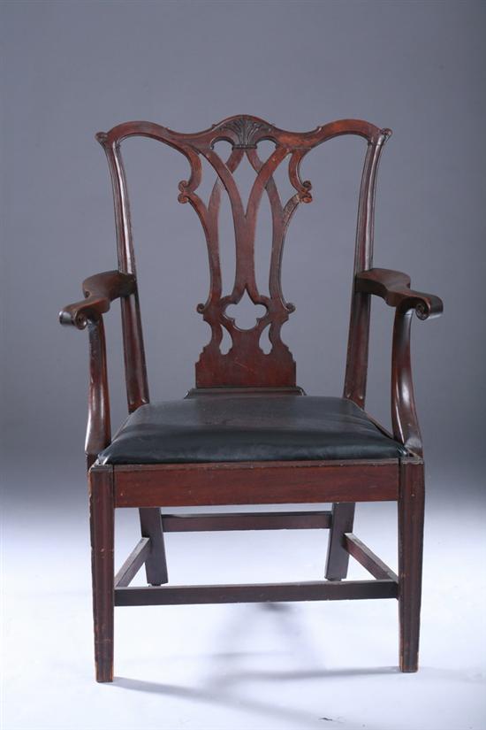 Appraisal: AMERICAN CHIPPENDALE STYLE MAHOGANY ARM CHAIR Circa with black slip-seat