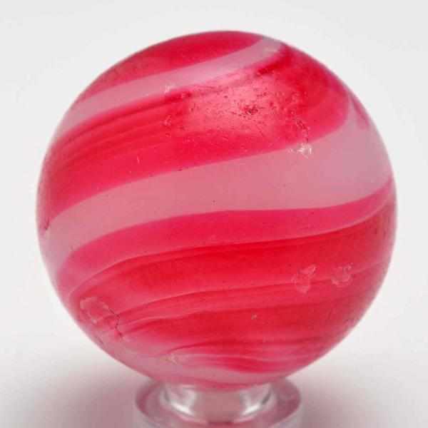 Appraisal: Large Opaque Swirl Marble Description White opaque base with pink