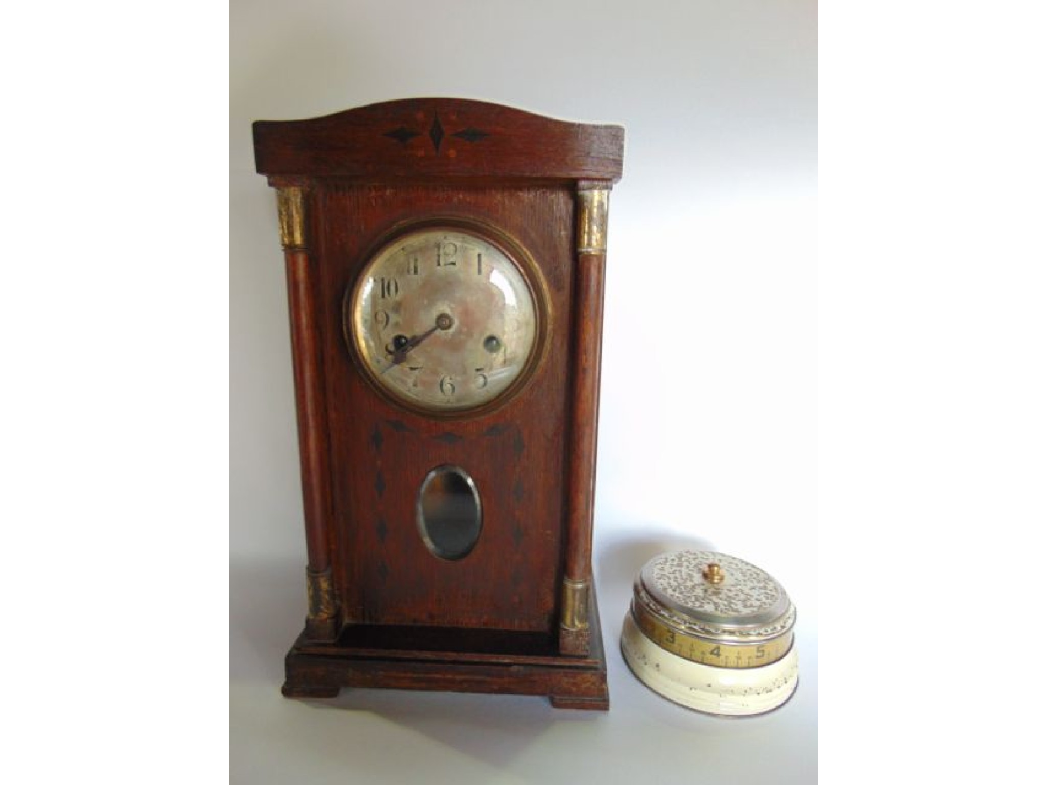 Appraisal: An early th century German mantle clock with oak case