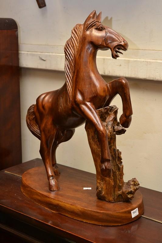 Appraisal: AN ORNAMENTAL TIMBER HORSE AN ORNAMENTAL TIMBER HORSE