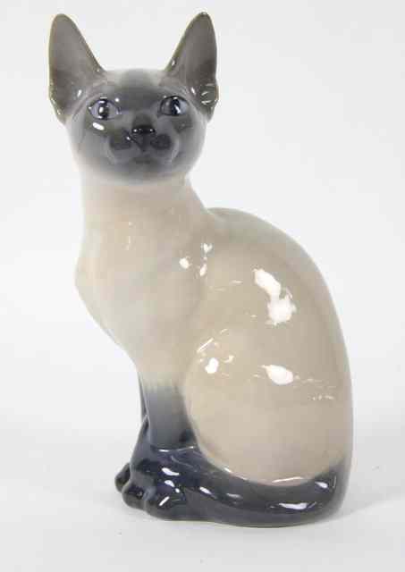 Appraisal: A Royal Copenhagen model of a Siamese cat cm high