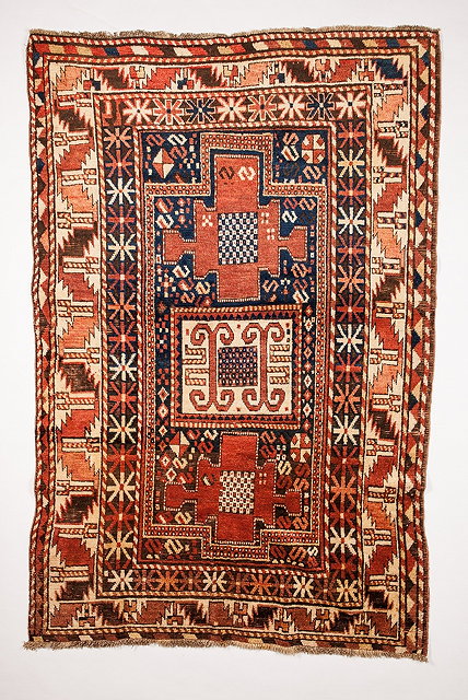 Appraisal: A KASAK BLUE GROUND RUG the central square hooked medallion