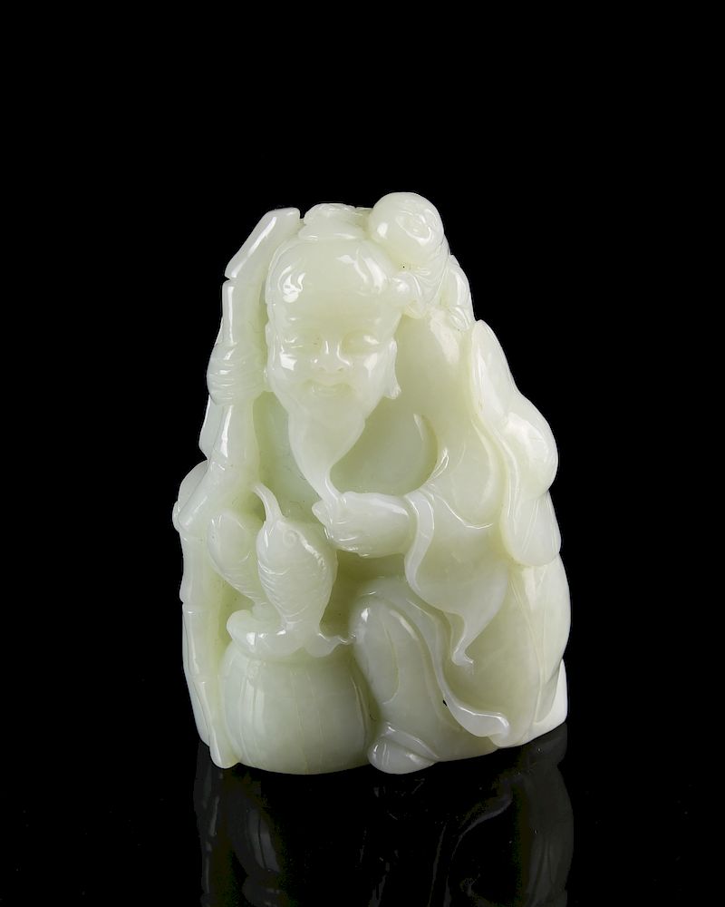 Appraisal: Chinese Carved Jade Figures With a long beard holding fish