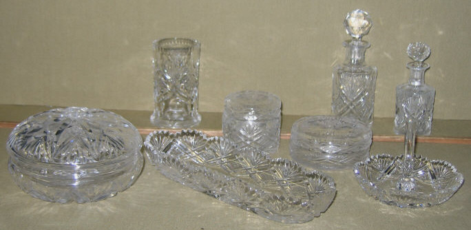 Appraisal: EIGHT PIECES CUT GLASS VANITY ITEMS Assembled comprising three cover