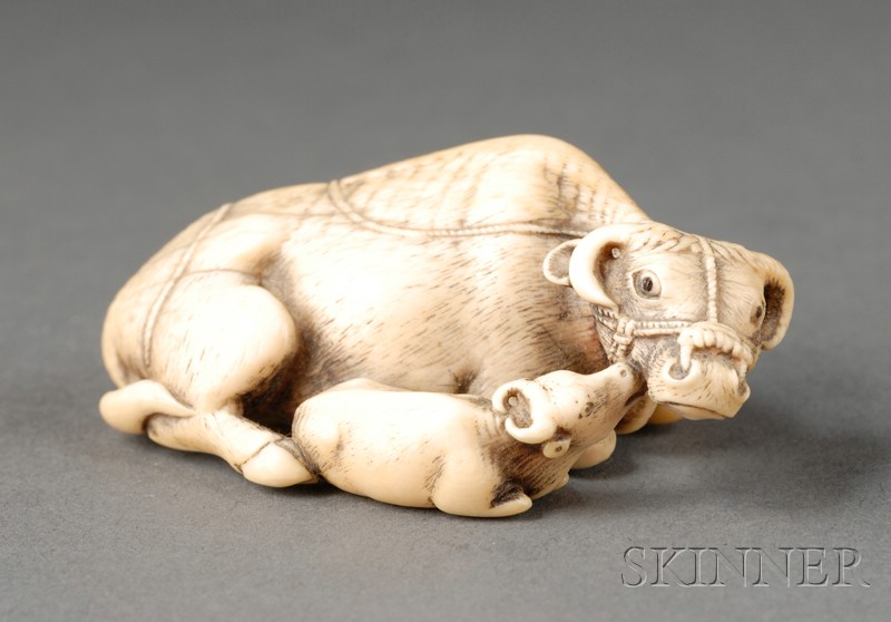 Appraisal: Ivory Toggle Japan th century netsuke of an ox and