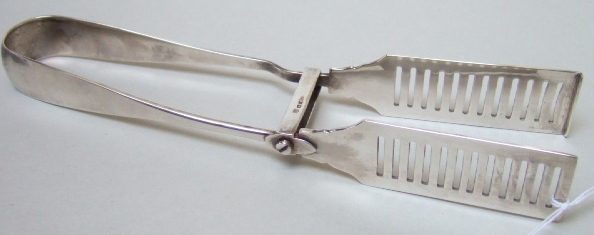 Appraisal: A pair of silver asparagus serving tongs with engraved decoration