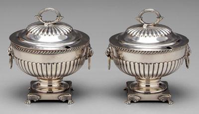 Appraisal: Pair silver plated sauce tureens lion and ring handles winged