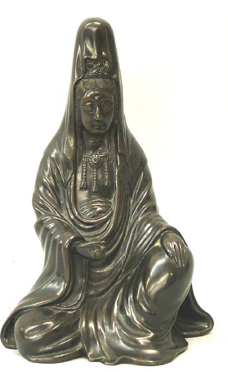 Appraisal: Good Eastern bronze figure depicting a seated Deity holding a